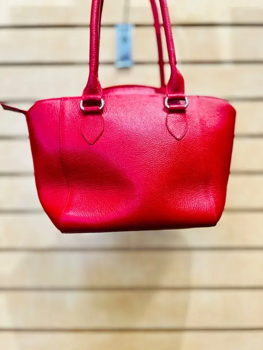 Bright red leather handbag