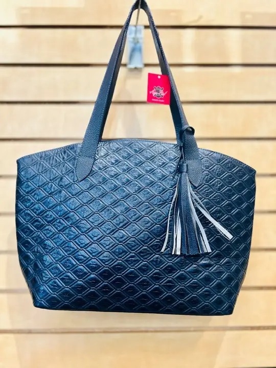 Navy embossed leather tote with tassel and shoulder straps
