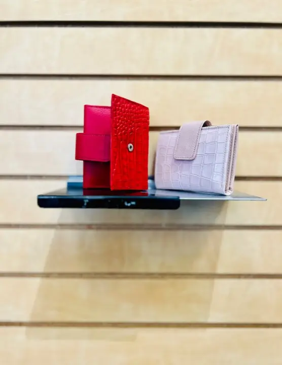 Red and lilac textured leather wallets